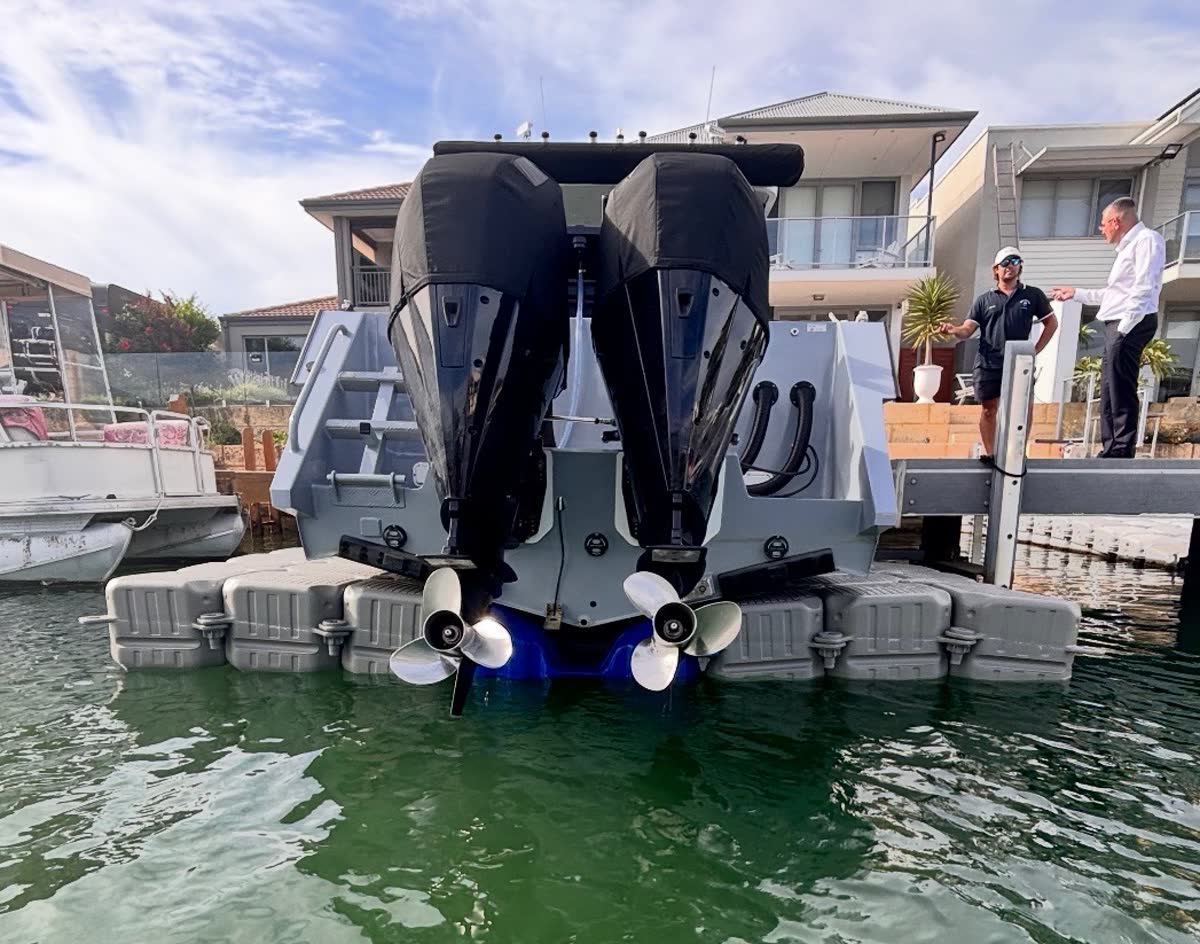 WS Docks team on site discussing a dock installation with a client