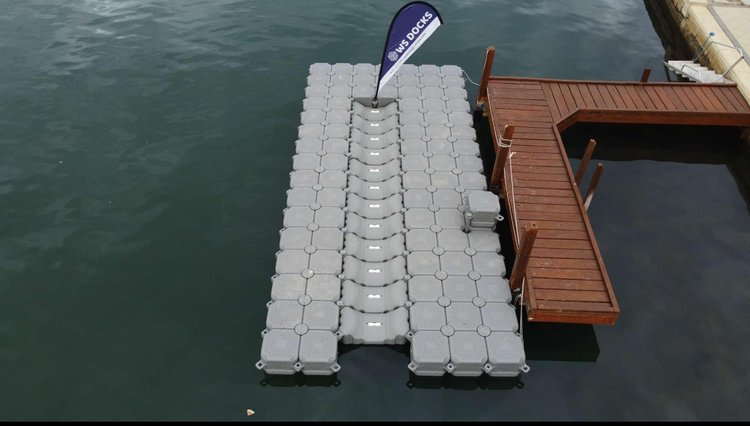A Dock with a flag that has the text WS Docks on it